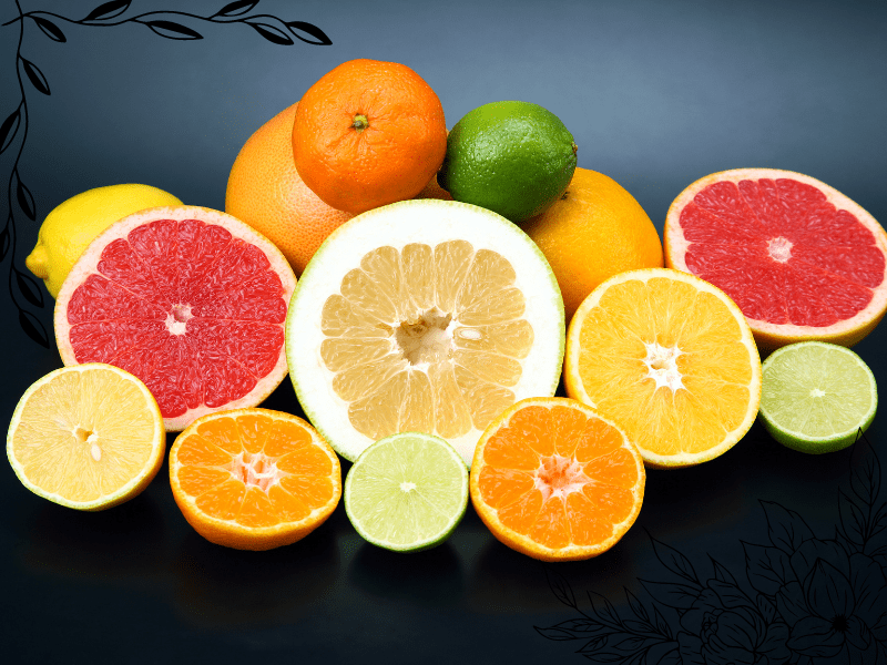 Close-up view of a freshly cut grapefruit, showcasing its juicy, pink flesh and vibrant rind. The image highlights the texture of the fruit's segments and the glistening juice, set against a neutral background.