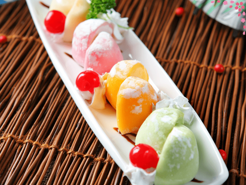 Mochi food: close-up of ice cream balls wrapped in chewy mochi, showcasing vibrant flavors and textures.